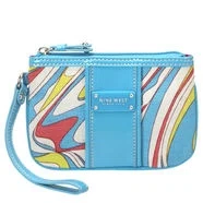 Mixed material printed wristlet with silver metal detail.                                    Measures approx. 6.5" L x 4.5" W x 0.5" D.

